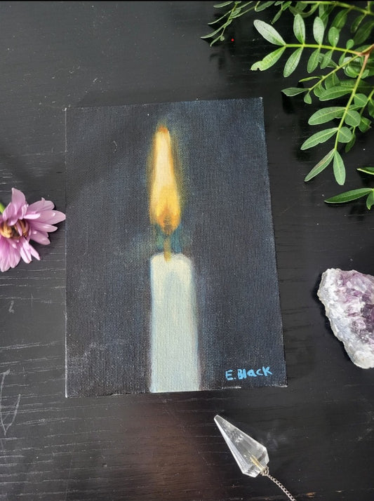Small painting of a candle on a dark surface with a pink flower and crystal nearby